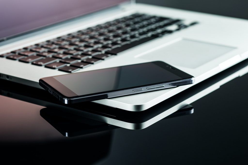 Smartphone and laptop.